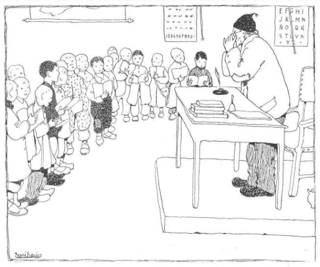 Ein Mann sitzt an einem Schreibtisch mit Büchern und Gegenständen vor einer Gruppe von Kindern, mit Papieren an der Wand hinter ihm, was darauf hindeutet, dass er wahrscheinlich ein Lehrer ist.