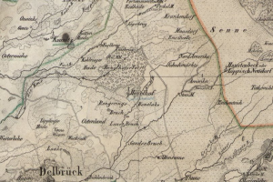 Ein detaillierter alter Stadtplan von Delbrück, Deutschland, der den Standort der Schlacht an der Somme hervorhebt, mit Straßen, Gebäuden und anderen Merkmalen beschriftet.